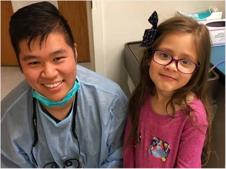 Aaron Duff, a pediatric dentist resident at El Rio Health in Southern Arizona, visits Ivanna, an anxious patient during a medical well visit that was made possible through funding received from Delta Dental of Arizona’s foundation. Photo by the El Rio Health Center.