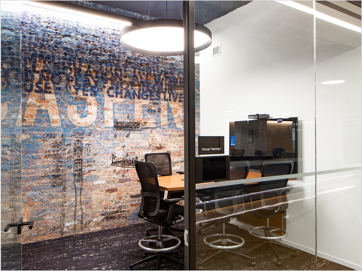 The new facility includes private virtual training studios as well as large training rooms. an audiovisual media wall, and full video conferencing capabilities.