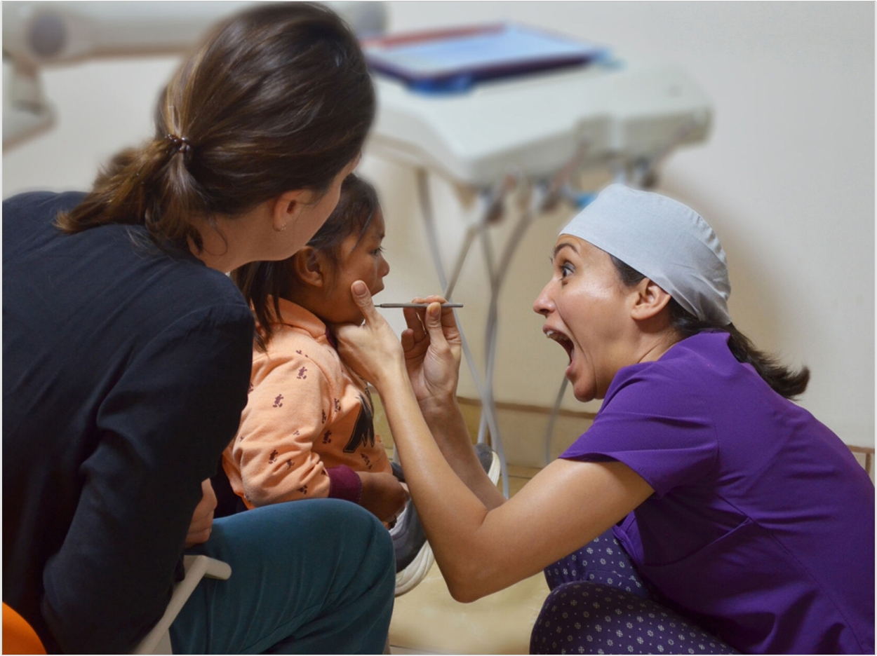 Dr. Ana Lucrecia Arias Ramirez checks the teeth of a child from the Chimaltenango region of Guatemala. For most, this trip to the dentist was their first.