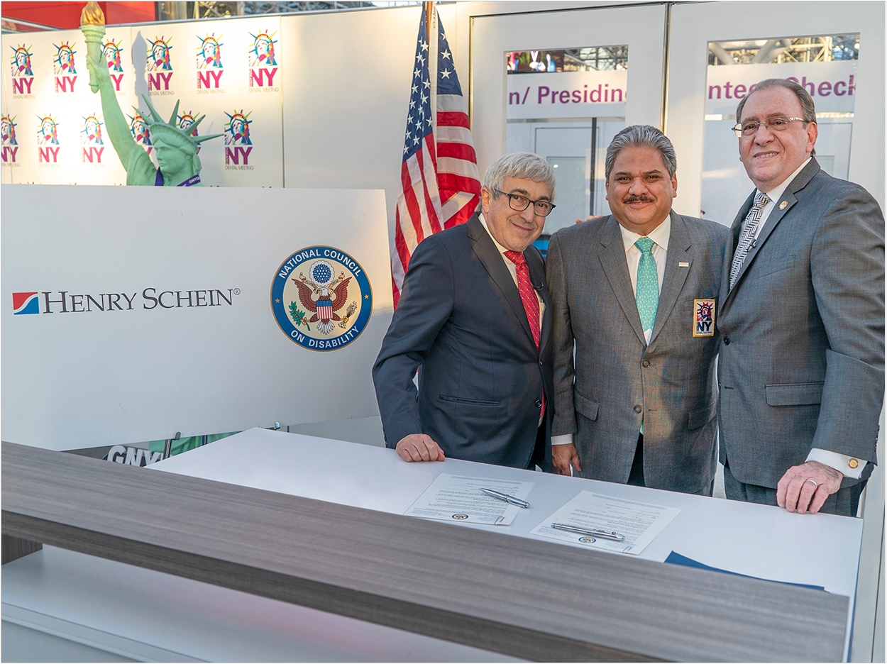 Left to right: Stanley M. Bergman, chairman of the board and CEO of Henry Schein; Dr. Lauro Medrano, general chairman of the Greater New York Dental Meeting; and Neil Romano, chairman of the National Council on Disability.