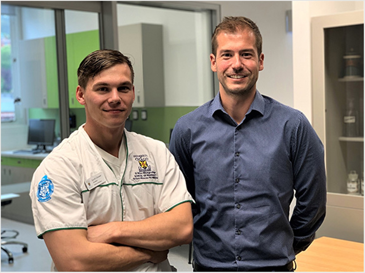 Pharmacy student Jacob Dresser (left) and pharmacy education associate professor Kyle Wilby.