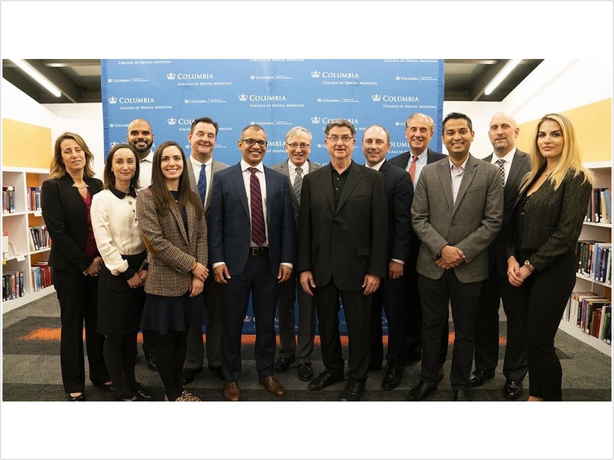 Implant fellows, CDM faculty, and Zimmer Biomet representatives at a reception in November.