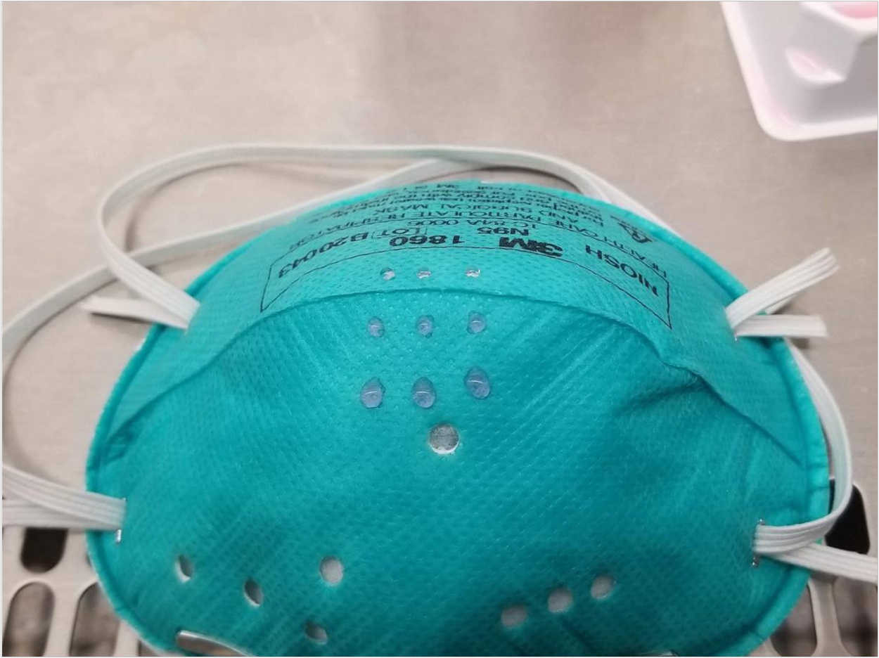 N95 with COVID-19 droplets. Henry Ford Health System / University of Michigan