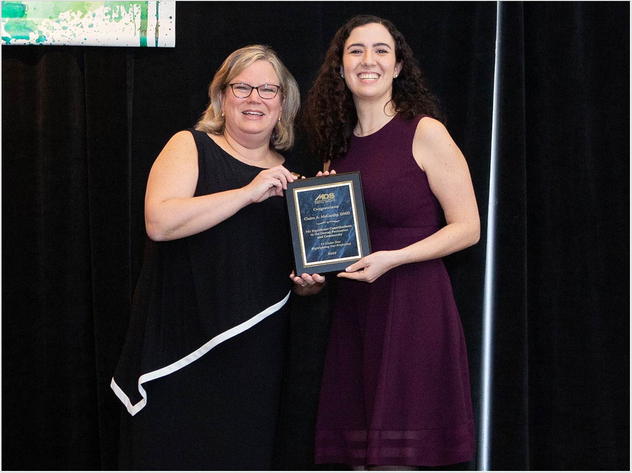 Claire A. McCarthy, DMD, (right) a general dentist practicing in Norwood and Quincy, was among the MDS's 10 Under Ten for 2020. She received her award from MDS immediate past president Dr. Janis Moriarty.