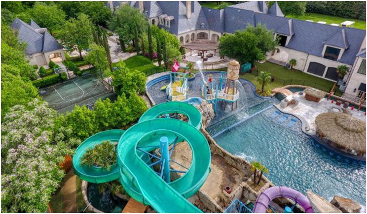Malouf's estate included its own waterpark as well as 10 bedrooms, 22 bathrooms, 10 living areas, four dining areas, a 10-car garage, two basketball courts, a tennis court, a gymnasium, and a bowling alley. Courtesy of Candy Evans.